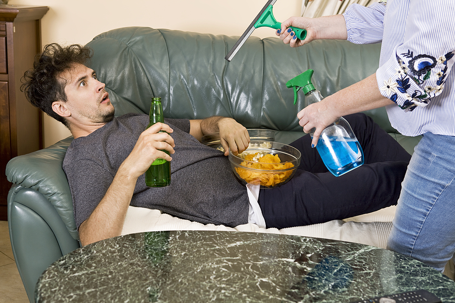 bigstock Man Is Drinking Beer And Watch 259165552