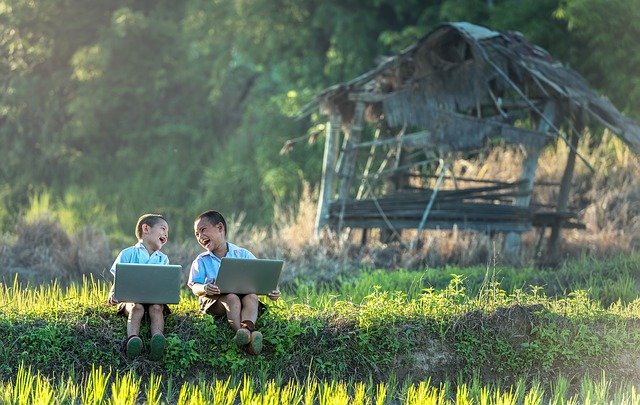 boys excited laptops
